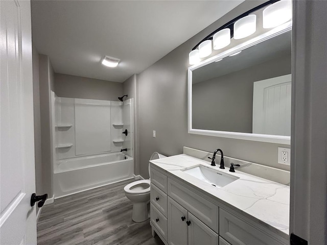 full bathroom with wood-type flooring, vanity, toilet, and shower / tub combination