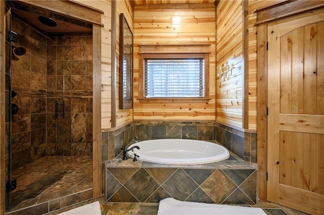 bathroom featuring plus walk in shower and wood walls