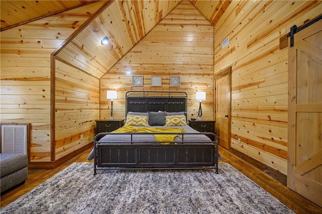 bedroom with hardwood / wood-style flooring, wood walls, wood ceiling, and high vaulted ceiling