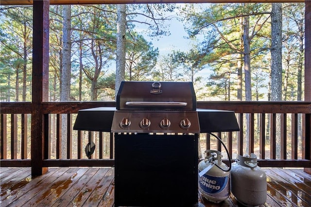 wooden deck with area for grilling