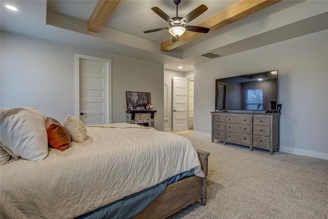 bedroom featuring beam ceiling, ceiling fan, and light colored carpet