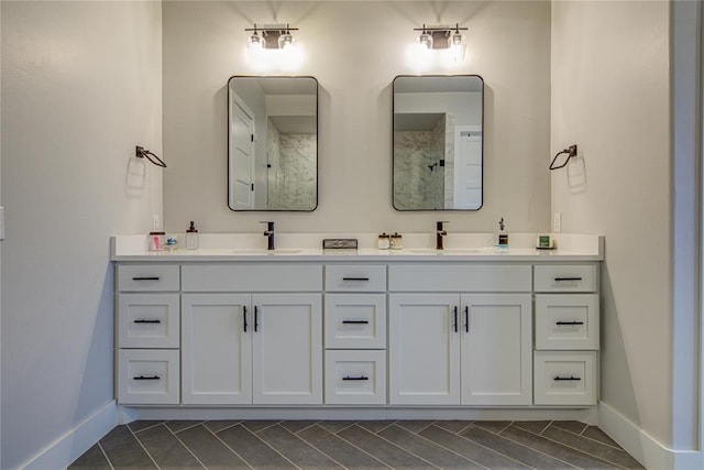 bathroom featuring tile patterned floors and vanity