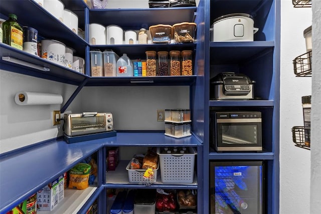 pantry featuring beverage cooler