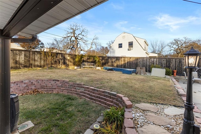 view of yard with central AC