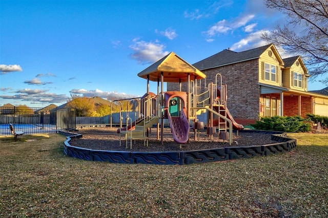 view of play area featuring a lawn