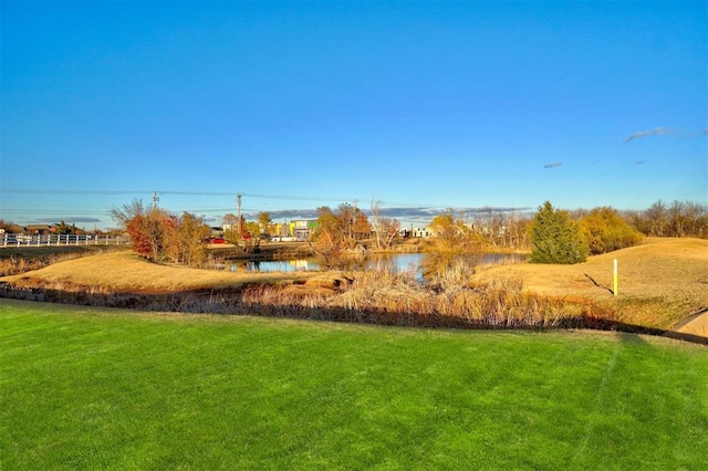 view of yard with a water view