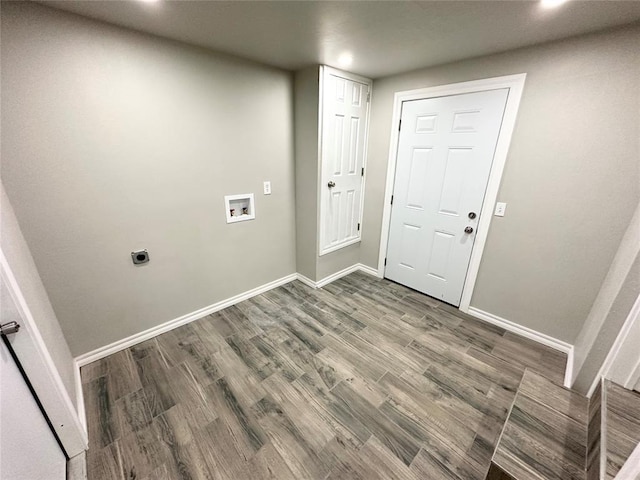 laundry area with hardwood / wood-style floors, hookup for an electric dryer, and hookup for a washing machine