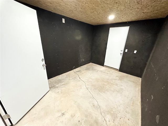 spare room featuring concrete floors