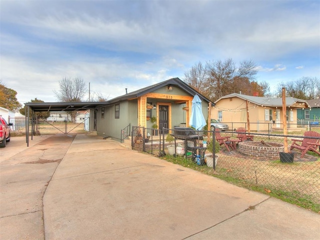 view of front facade with a carport