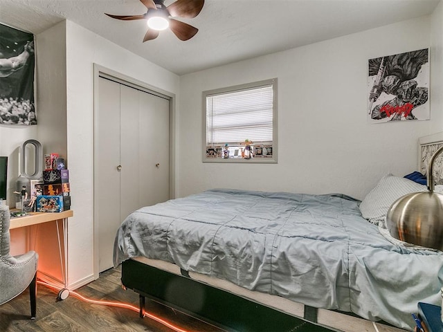 bedroom featuring a closet, ceiling fan, and dark wood-type flooring