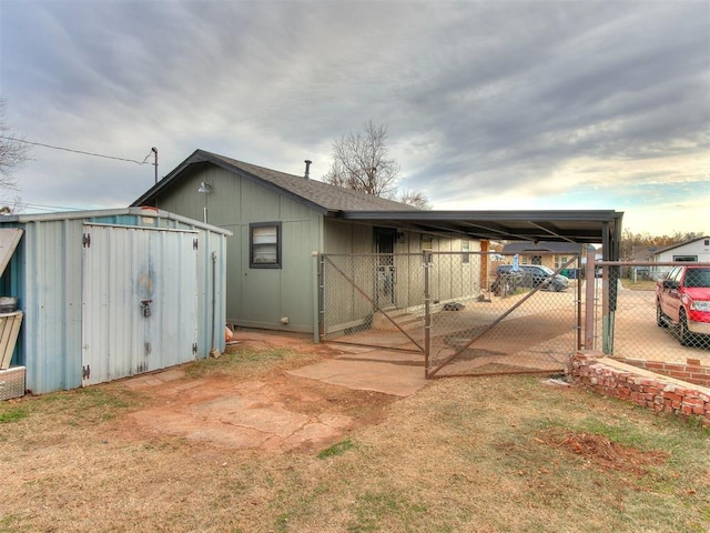 exterior space with a carport