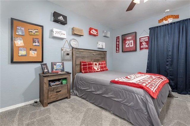 bedroom with ceiling fan and carpet