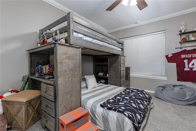 bedroom featuring carpet flooring, ceiling fan, and crown molding