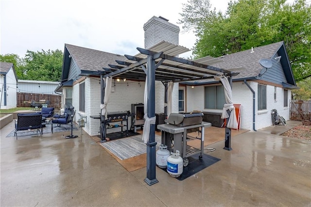 back of house with a pergola and a patio