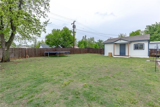 view of yard featuring a trampoline