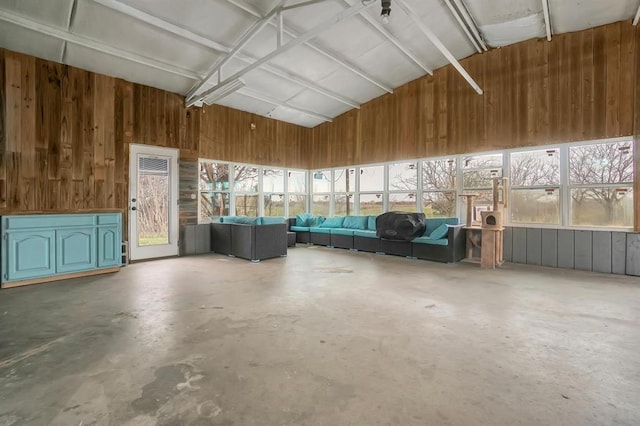 garage featuring wood walls