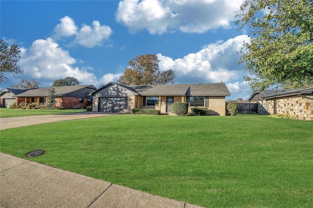 ranch-style house with a garage and a front yard