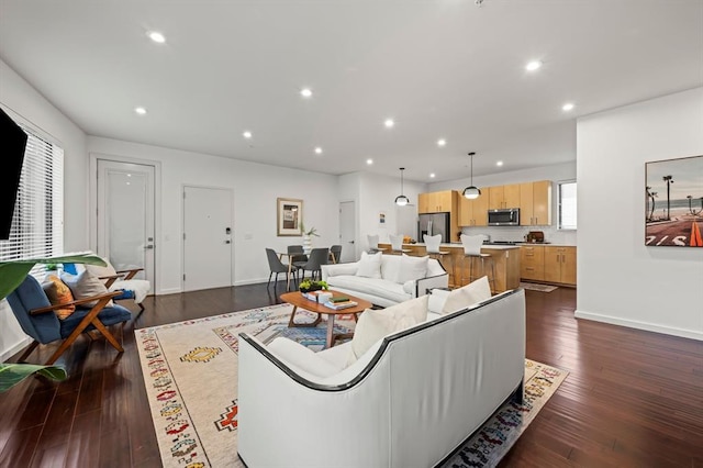 living room with dark wood-type flooring