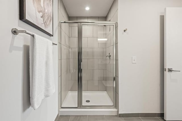 bathroom featuring tile patterned floors and walk in shower