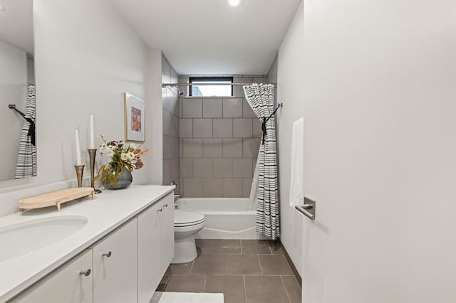 full bathroom featuring tile patterned flooring, vanity, shower / bath combination with curtain, and toilet