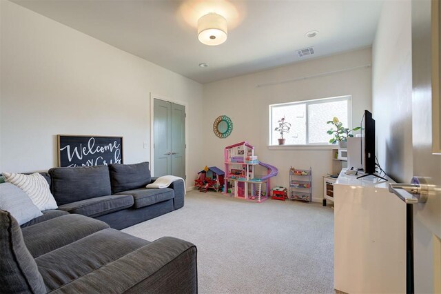 recreation room featuring carpet flooring