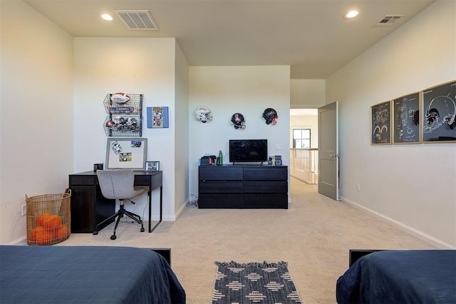 bedroom featuring light carpet