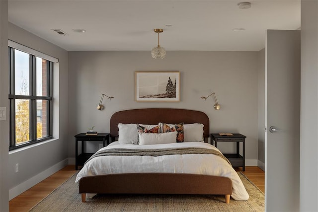 bedroom featuring light wood-type flooring