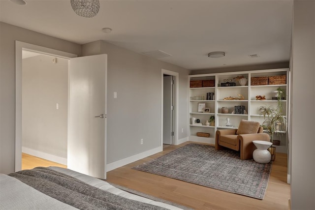 living area with light hardwood / wood-style floors