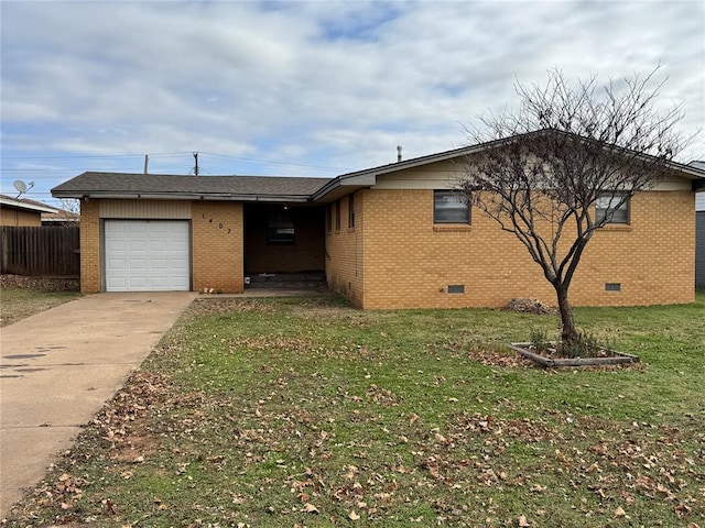 view of front of property with a garage and a front yard