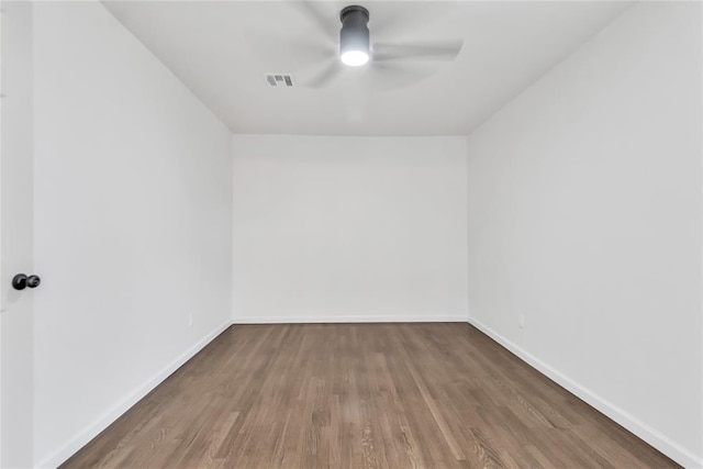 empty room featuring hardwood / wood-style floors