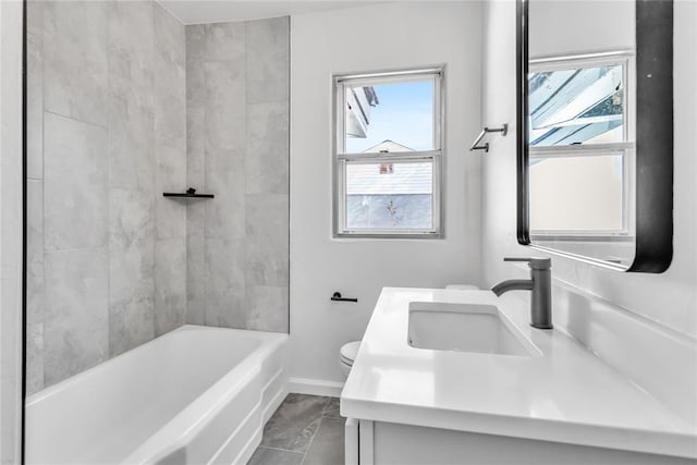 full bathroom featuring tile patterned floors, vanity, toilet, and shower / bathtub combination