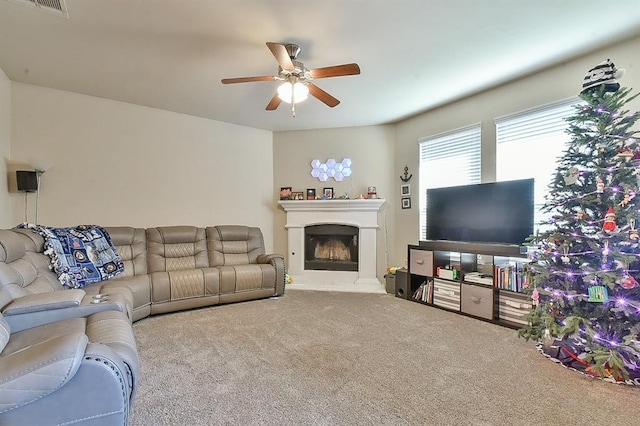 living room with carpet and ceiling fan