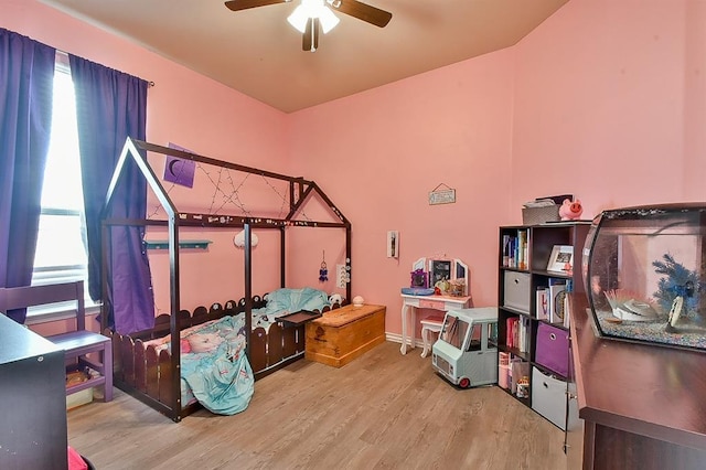 bedroom featuring ceiling fan and light wood-type flooring