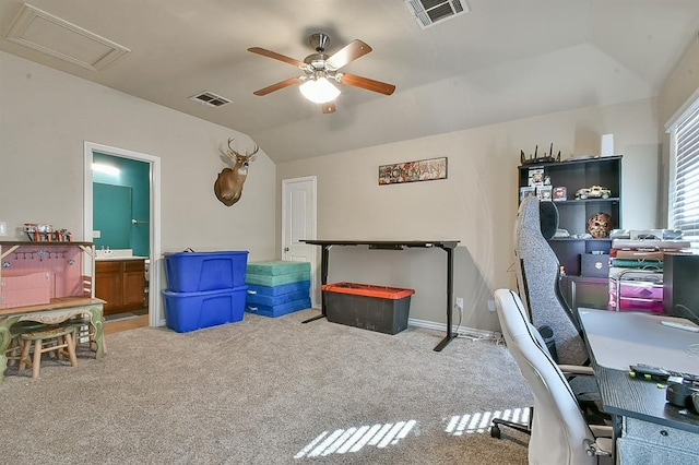 office space with light colored carpet, ceiling fan, and lofted ceiling