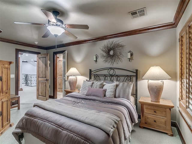 bedroom featuring light carpet, ceiling fan, and crown molding