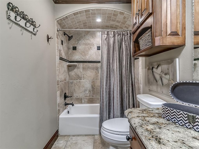 full bathroom featuring vanity, toilet, and shower / tub combo