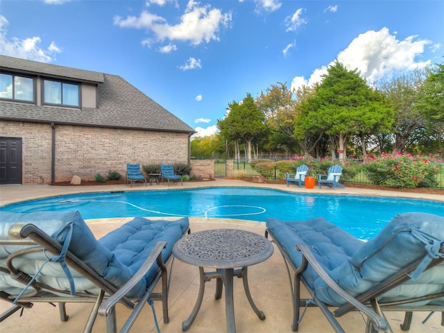 view of pool with a patio area