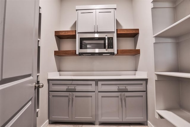 kitchen featuring gray cabinetry