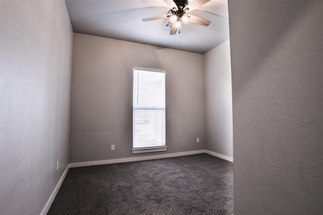 carpeted empty room with ceiling fan