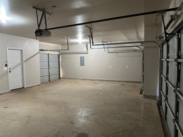 garage with electric panel and a garage door opener