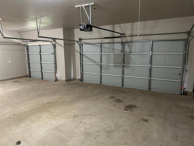 garage featuring a garage door opener