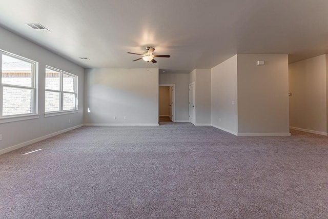 unfurnished room with carpet floors and ceiling fan