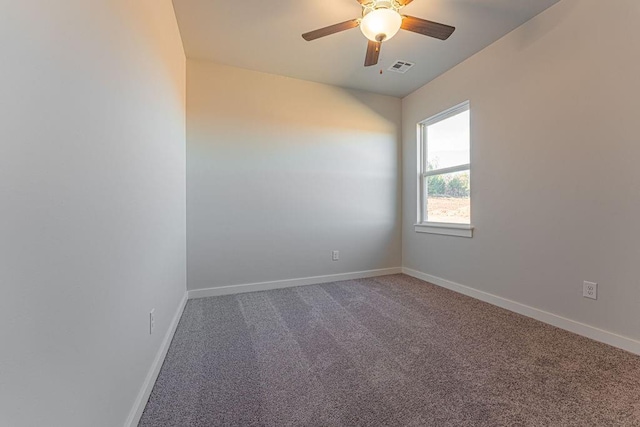 carpeted empty room with ceiling fan