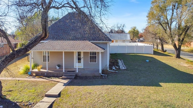 view of front facade with a porch and a front yard