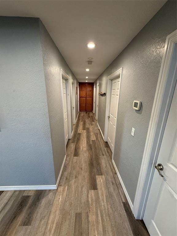 hall featuring dark wood-type flooring