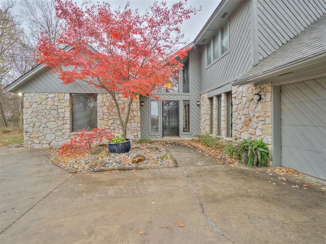 exterior space with a garage