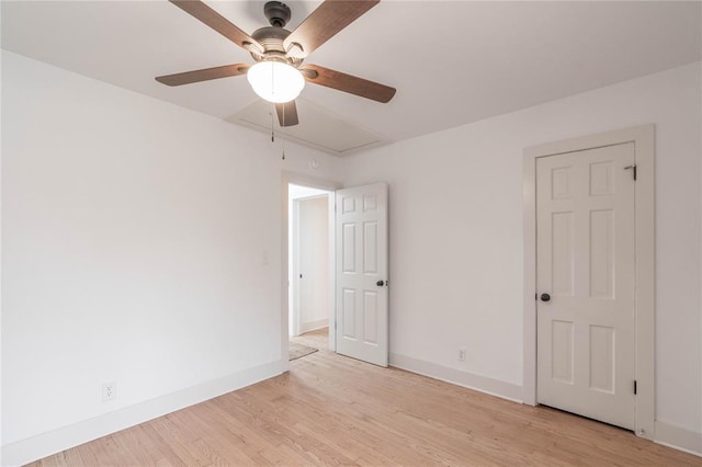 unfurnished room featuring ceiling fan and light hardwood / wood-style floors