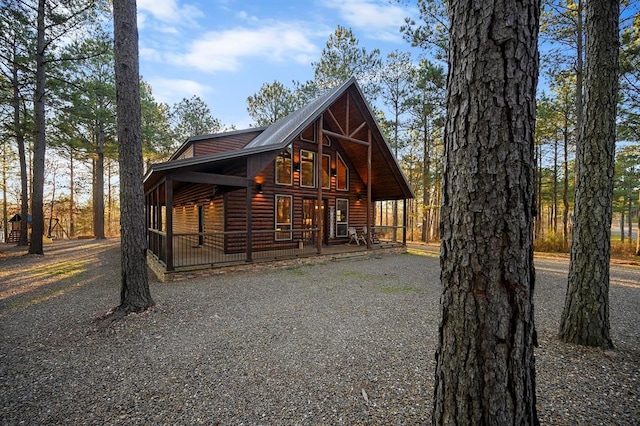 view of log cabin