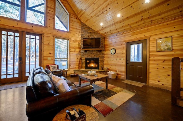 living room with french doors, wooden walls, high vaulted ceiling, wooden ceiling, and a fireplace