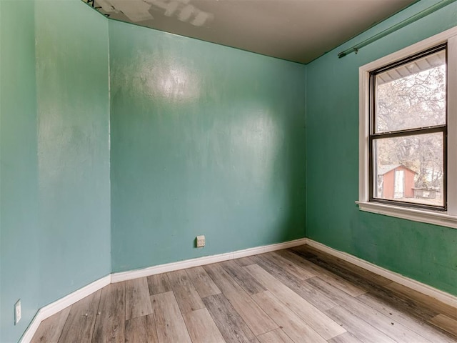 unfurnished room featuring light wood-type flooring